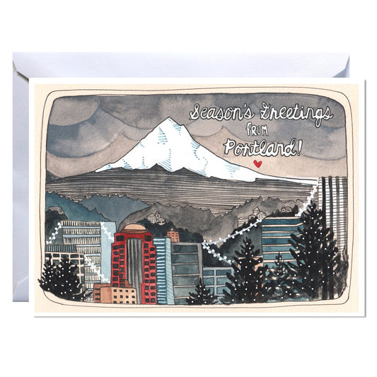 Greeting card with mountain and cityscape illustration and 'Season's greetings from Portland!' text.
