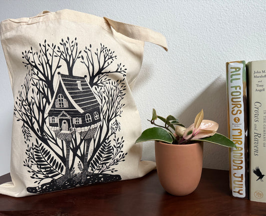 tote bag featuring baba Yaga's chicken leg house in the woods