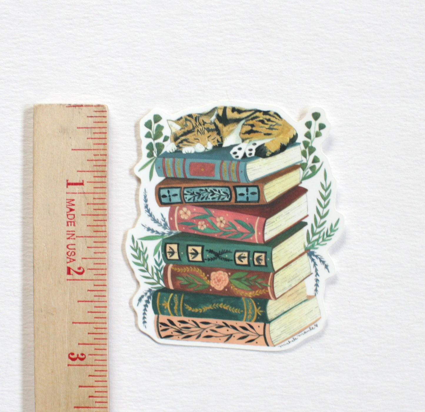 Cat Napping on Books Vinyl Sticker