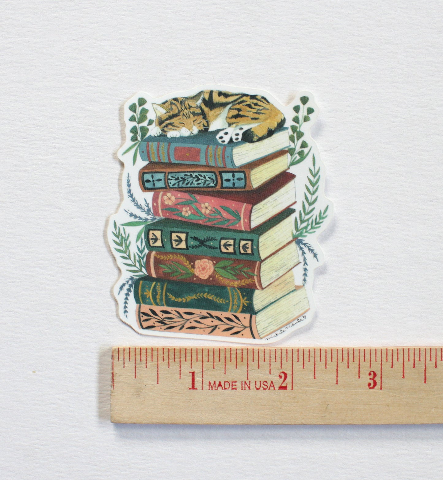 Cat Napping on Books Vinyl Sticker