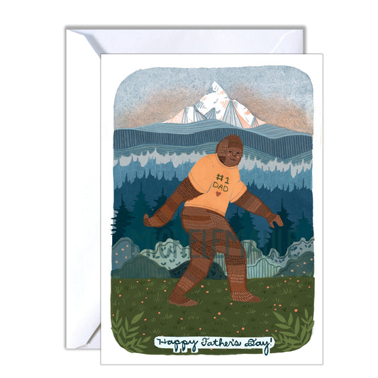 Greeting card with an illustration of Sasquatch wearing an '#1 Dad' shirt in a mountainous landscape.
